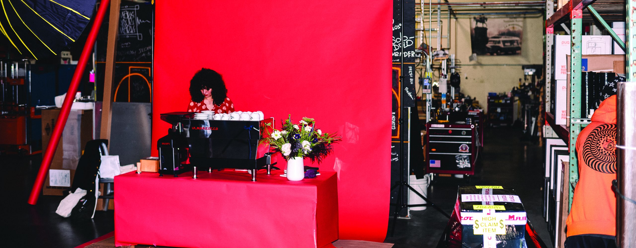 Scene of a photoshoot amongst La Marzocco machines