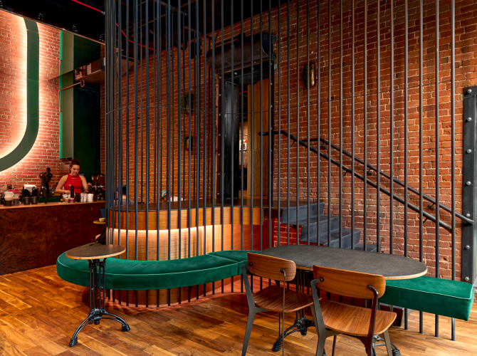 the interior of slow by slow coffee bar in boise, with wood panelling and a distinct walnut bar